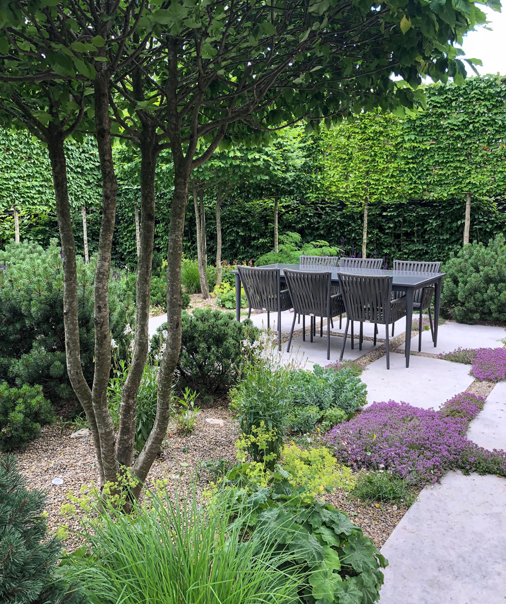 Colm Joseph suffolk garden designers dining terrace water feature salvia natural stone paving outdoor living space