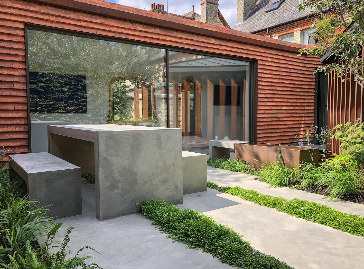 Colm Joseph Cambridge garden design modern house petersen bricks concrete furniture architecture extension