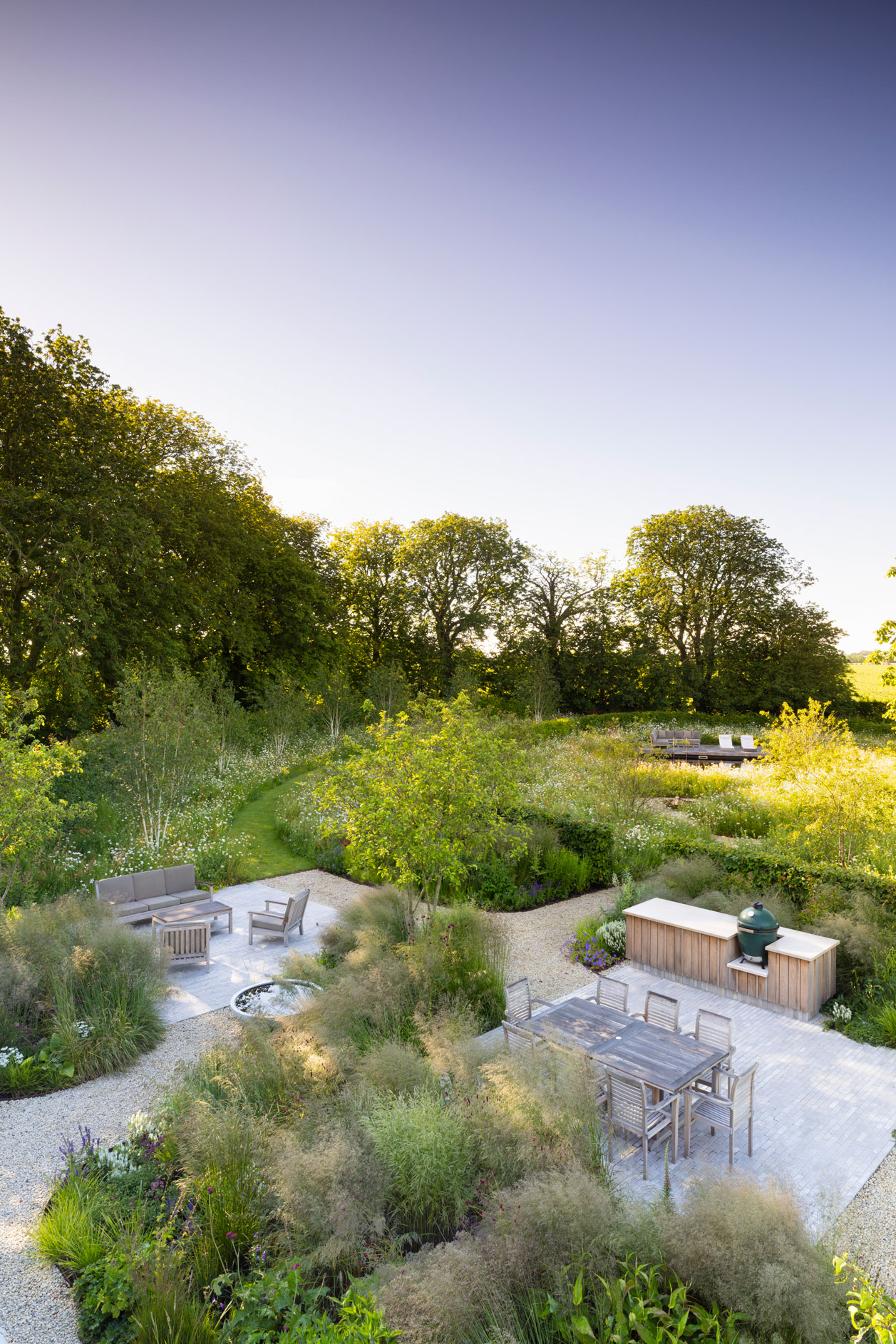 Colm Joseph Cambridgeshire country garden modern overhead view curvilinear design seating areas outdoor kitchen hornbeam hedging multi-stem malus betula