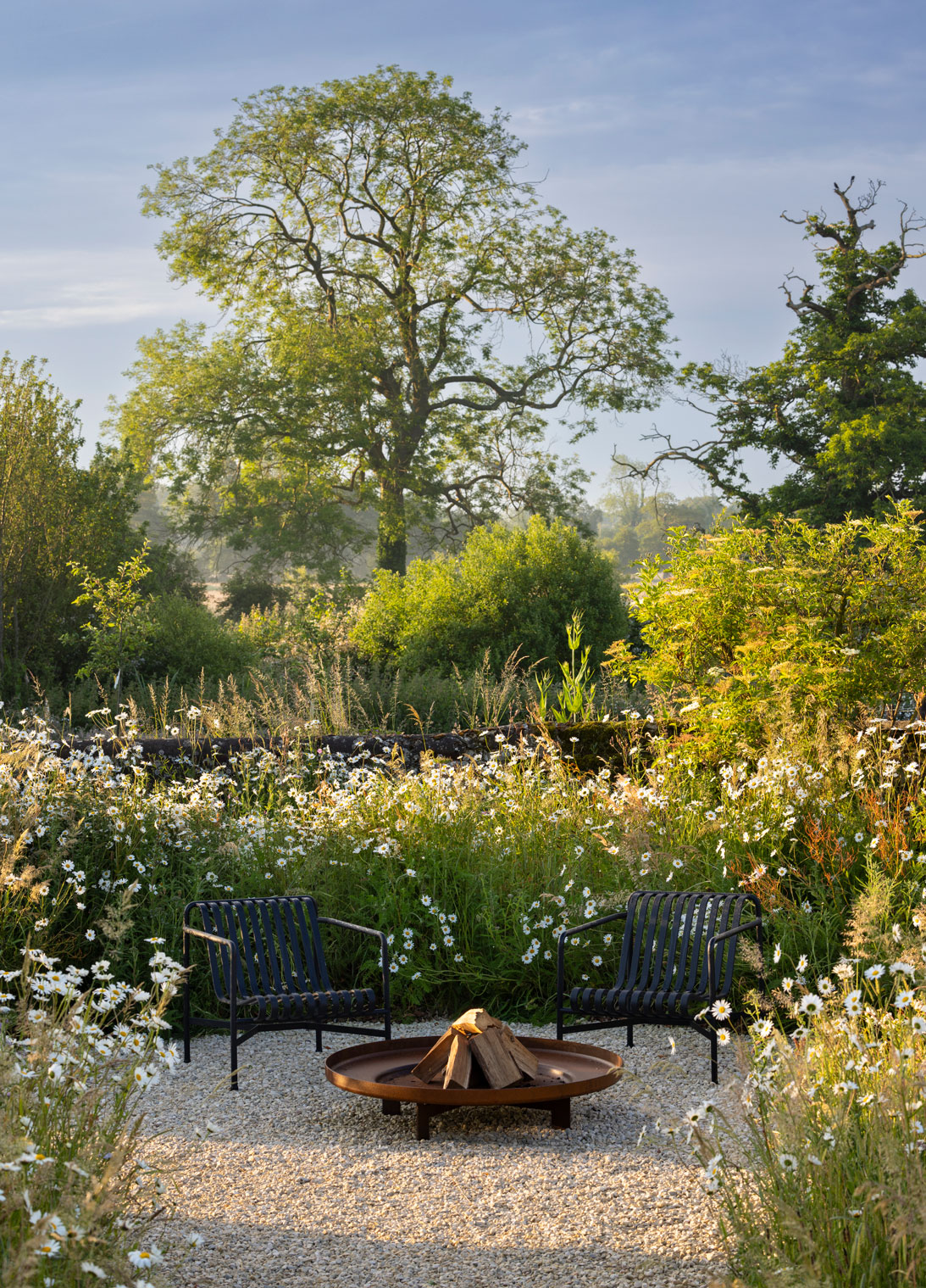 Colm Joseph suffolk walled garden naturalistic design wildflower meadow corten firepit seating area landscape